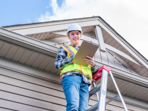 Roofing contractor in Austin performing a thorough roof inspection