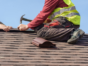 Securing shingles on a Hutto home in preparation for storm season.