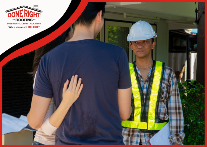 A homeowner discussing project details with a Rockdale roofing contractor.